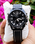 Black Sports Watch with Leather Strap and Multi-Function Dial