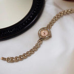 WHL Round Rhinestone Bezel Women's Watch